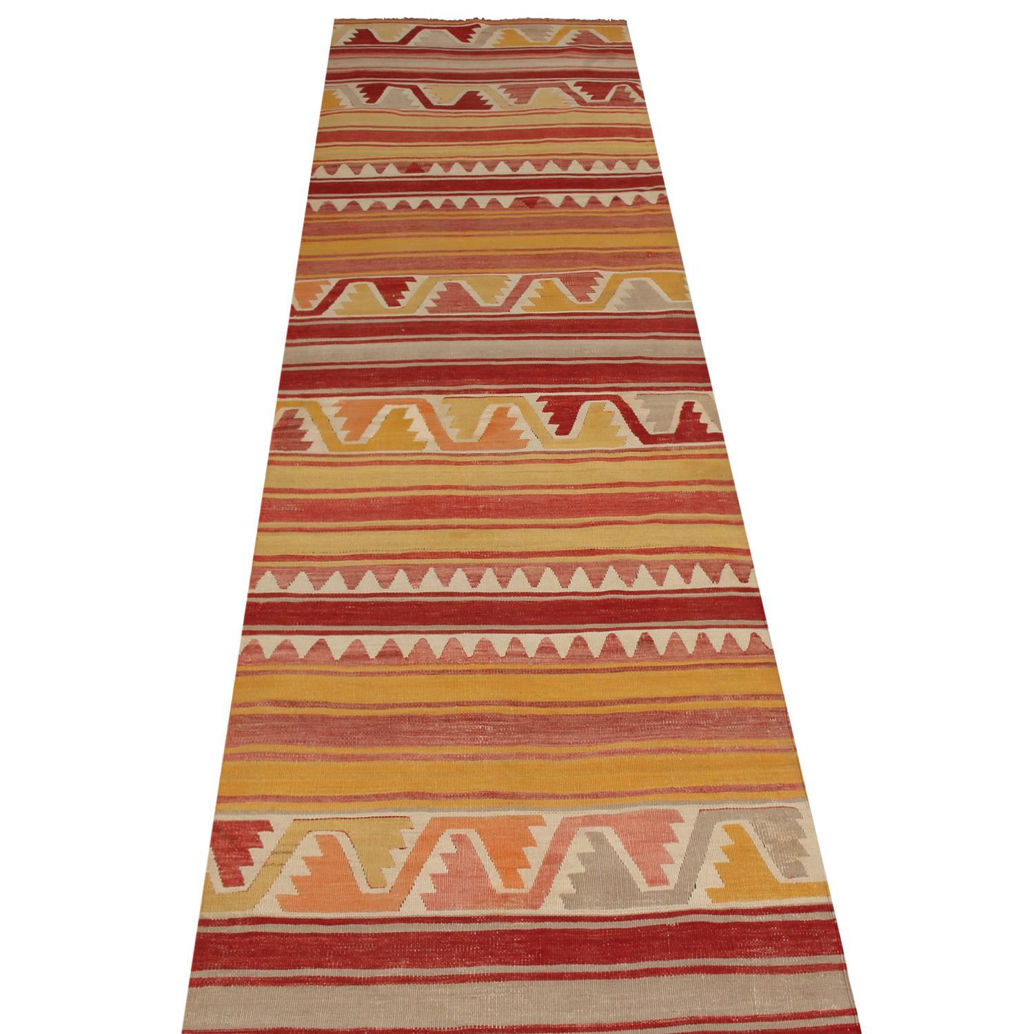 Flat-woven in high-quality wool originating from Turkey between 1940-1950, this vintage Konya Kilim rug enjoys a finely woven, colorfully appealing geometric field design complementing its length with distinguished stripes, enjoying an uncommon