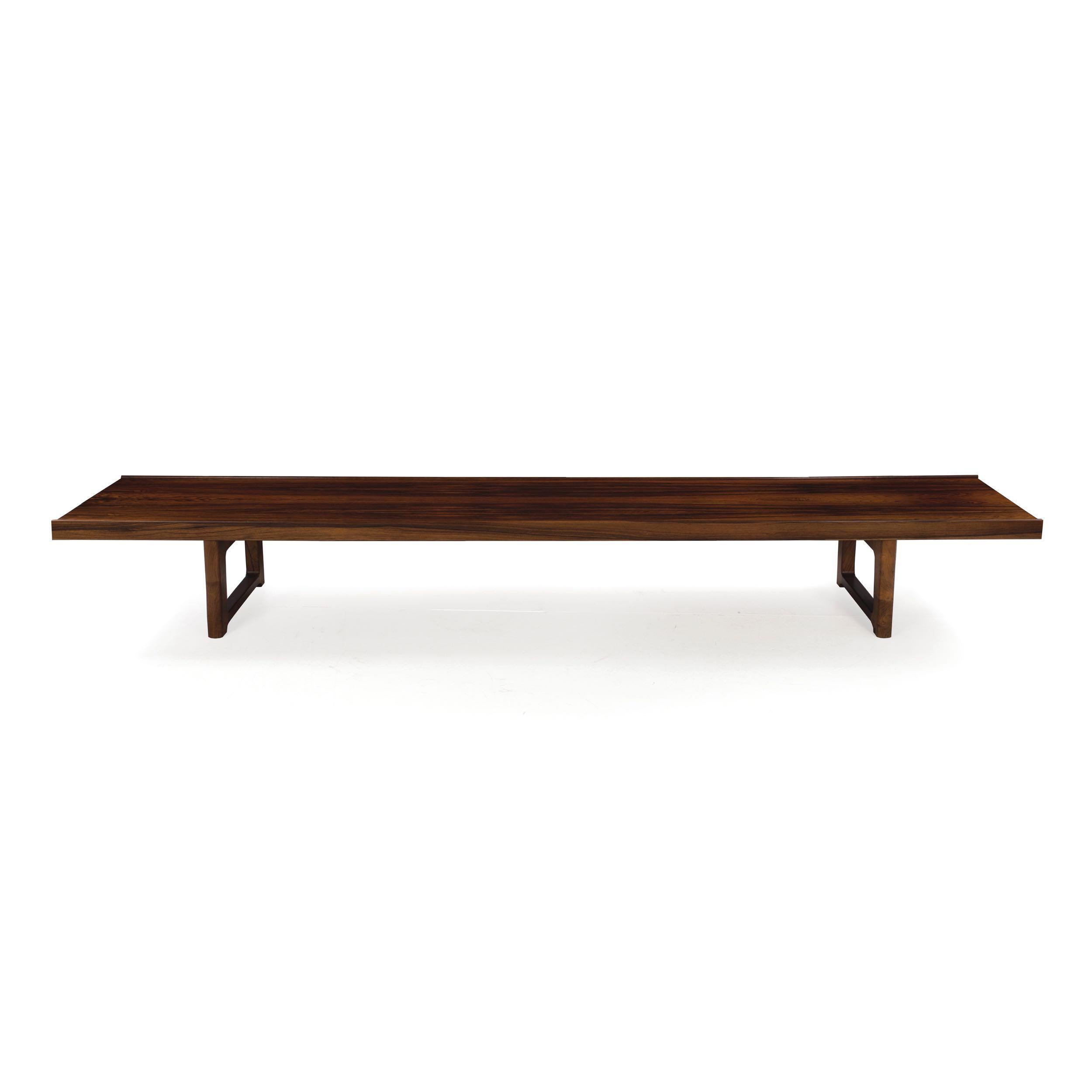 A handsome and versatile long bench designed by Torbjorn Afdal for Bruskbo and manufactured by Mellemstrands Trevareindustri SA of Norway, it is part of a series of benches titled 