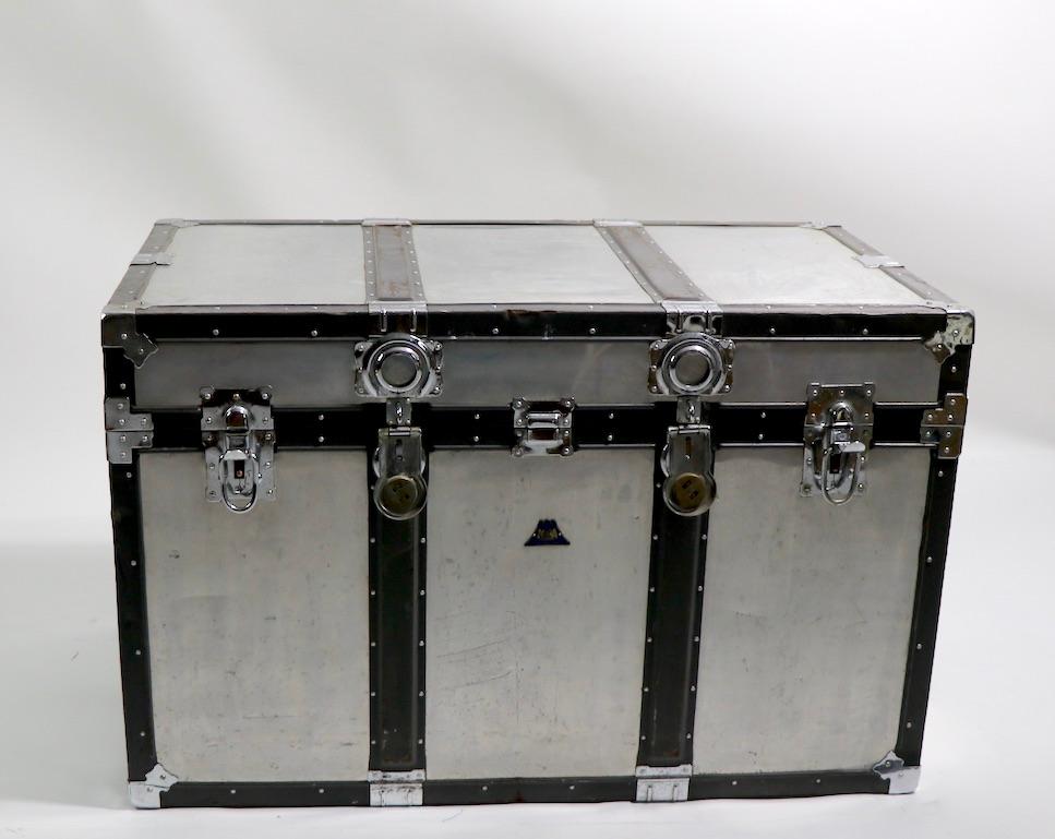 Nice 1940s aluminum trunk Made in Japan by KOWA. This example is in good, original condition, showing some cosmetic wear, normal and consistent with age. The trunk is not locked, but we do not have keys. Grewat as a decorative coffee table, or side