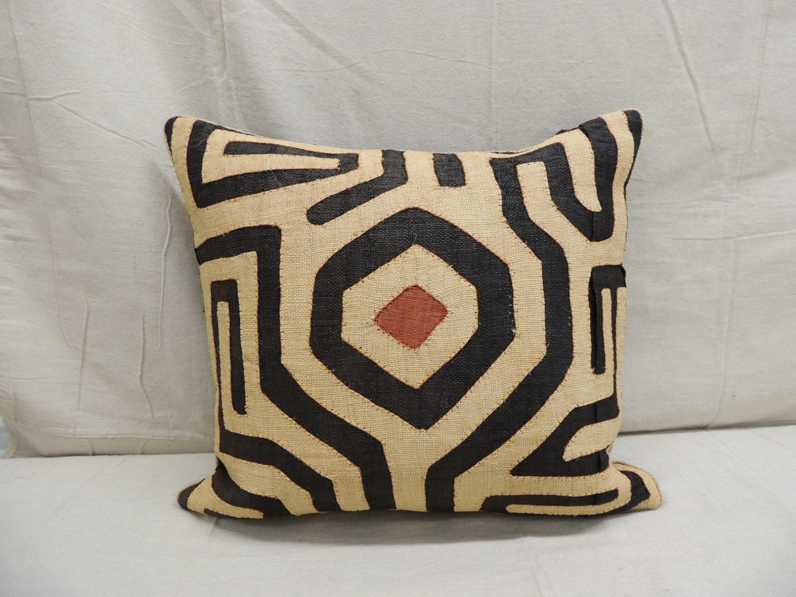 Vintage Kuba Tan and black handwoven patchwork square African Decorative Pillow
with antique orange linen backing and decorative jute trim all around.
Handwoven patchwork and appliqué raffia African decorative lumbar pillow with labyrinth