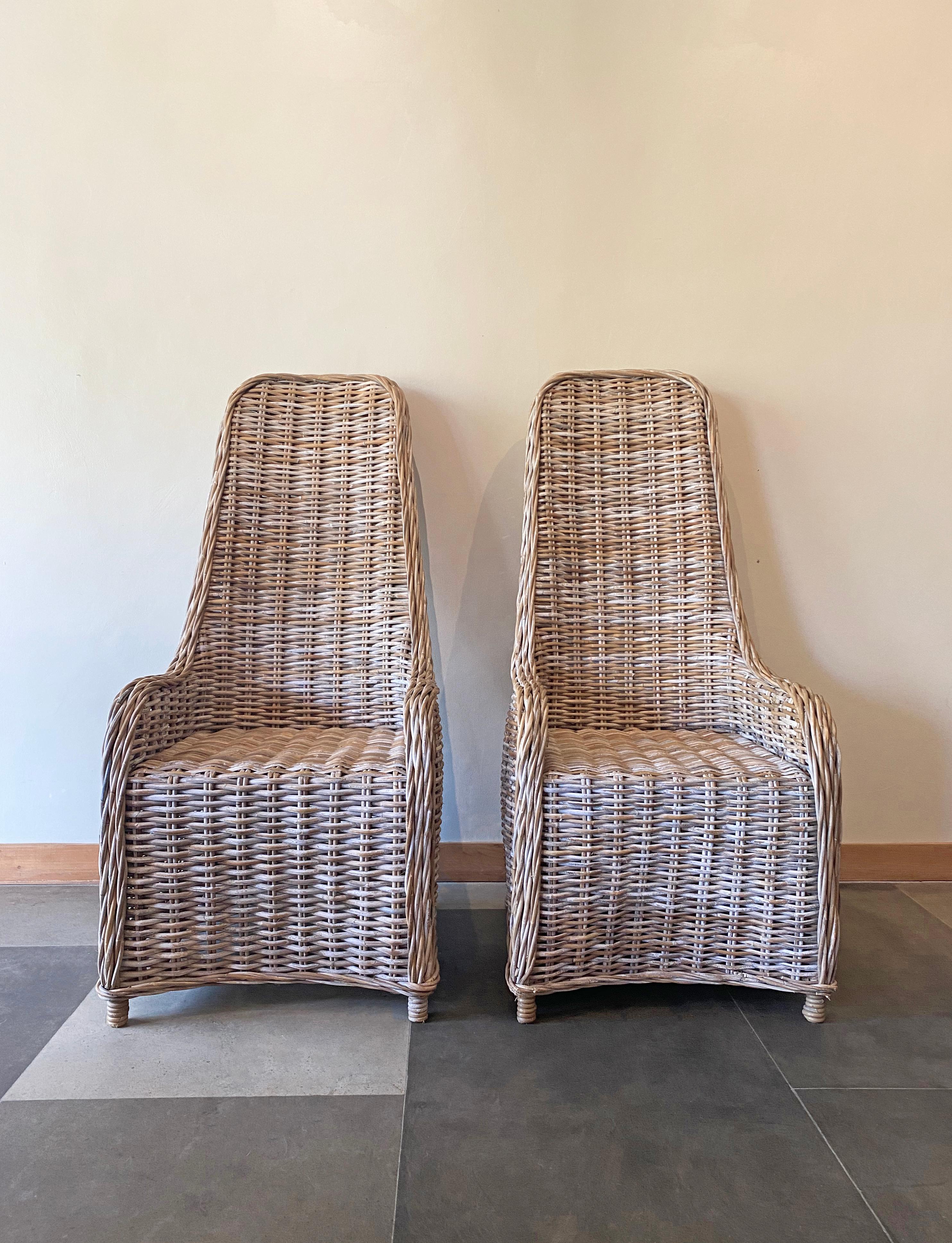 These wonderfully sculpted vintage chairs with their elegant tall shape are composed of woven Kubu Rattan. Kubu Rattan is know for its natural grey colour. They were crafted on the Island of Bali, Indonesia by skilful artisans. 

Dimensions: