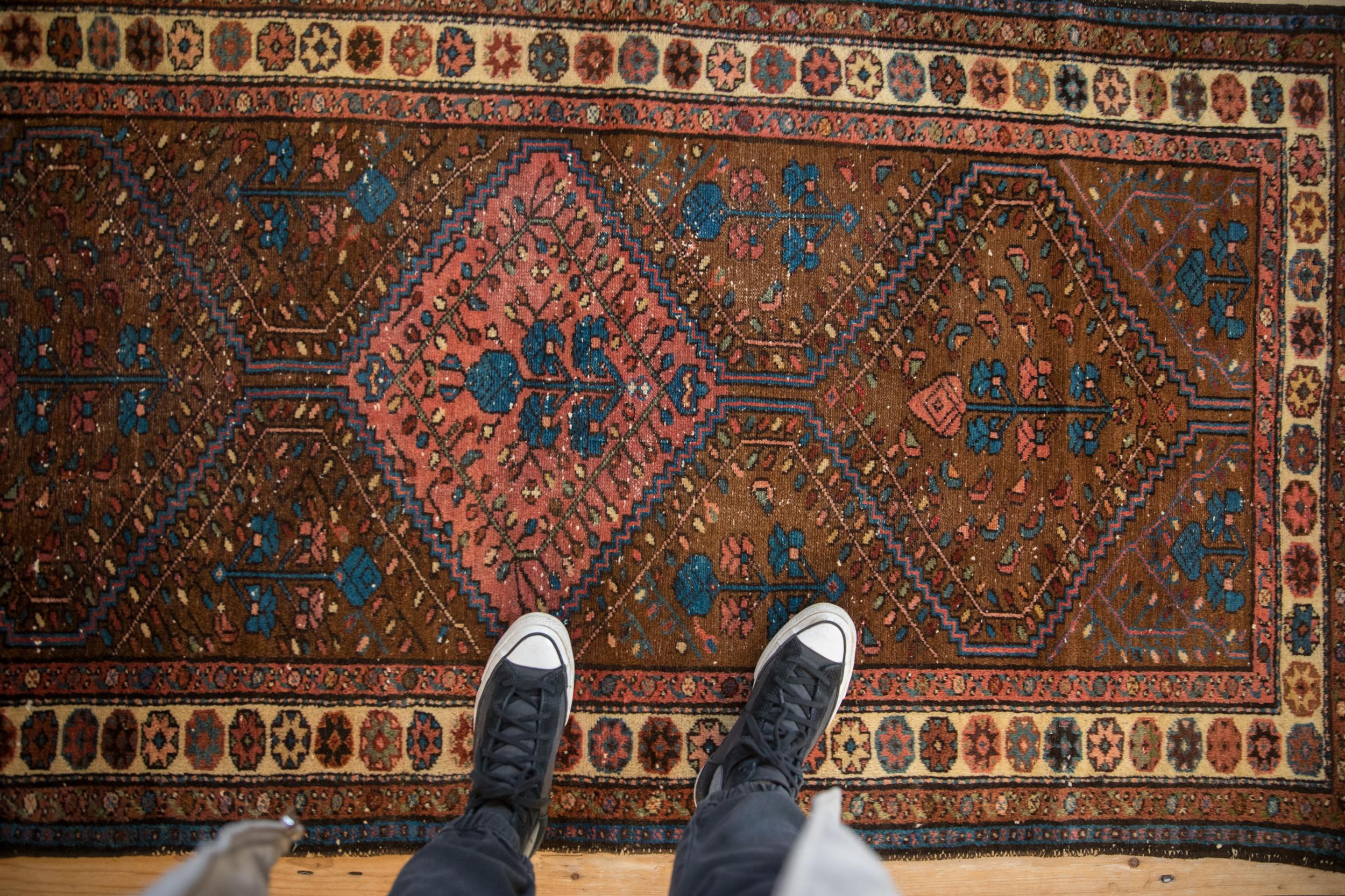 :: Triple center medallion with inverted coloration filled with germinating tree of life design motif. Main border in a repeating pomegranate top view design. Colors and shades include: Camel, brick red, dark chocolate brown, dusty sapphire blue,