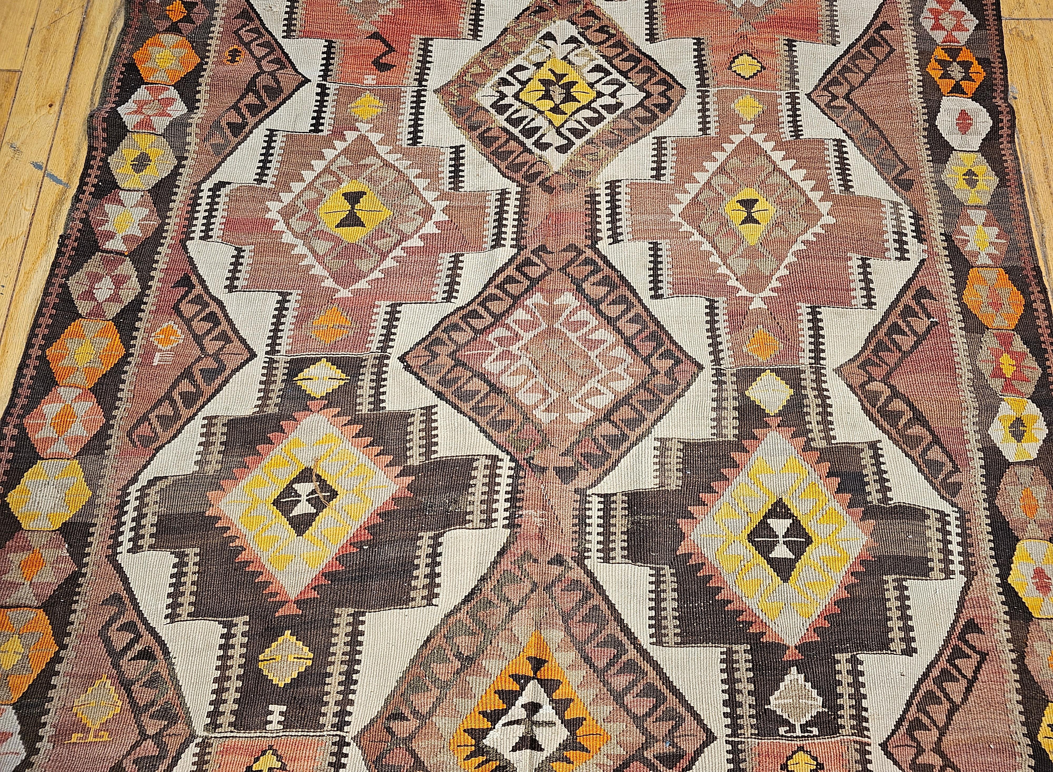Vegetable Dyed Vintage Kurdish Kilim in Allover Geometric Pattern in Brown, Ivory, Yellow, Red For Sale