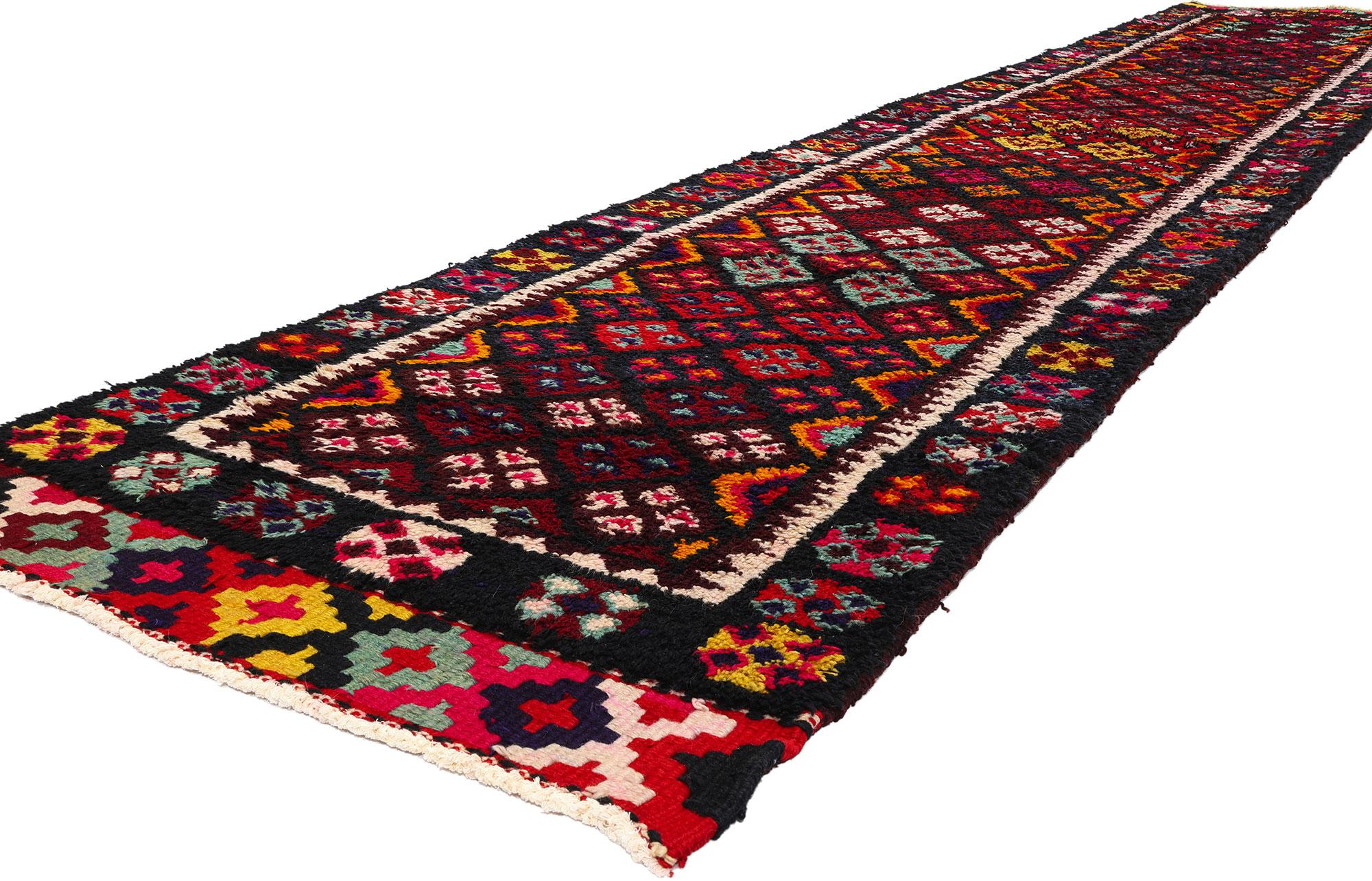 53890 Vintage Kurdish Tribal Rug Runner, 03'00 x 16'03. Handcrafted by Kurdish Herki tribes in eastern Turkey, notably in the Hakkari province, Kurdish rugs are renowned for their geometric patterns and vivid hues. Woven meticulously with premium