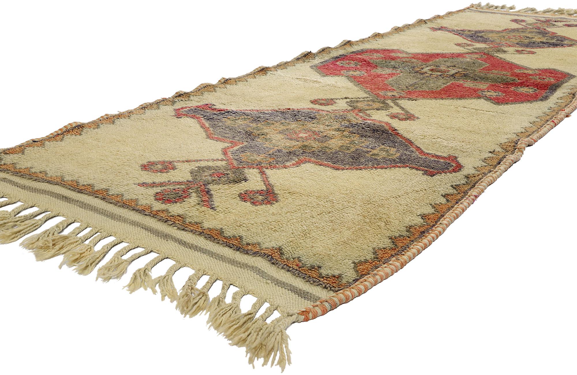 53893 Vintage Kurdish Tribal Rug, 03'04 x 10'07. Kurdish rugs, meticulously crafted by Kurdish Herki tribes in eastern Turkey, notably in the Hakkari province, boast distinctive geometric patterns and a rich array of colors. Fashioned from premium