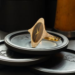 Vintage Kutchinsky x Chopard 18 carats et diamants pavés et oeil de tigre ovale