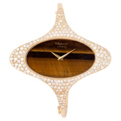 Vintage Kutchinsky x Chopard 18 quilates y pavé de diamantes y óvalo de ojo de tigre