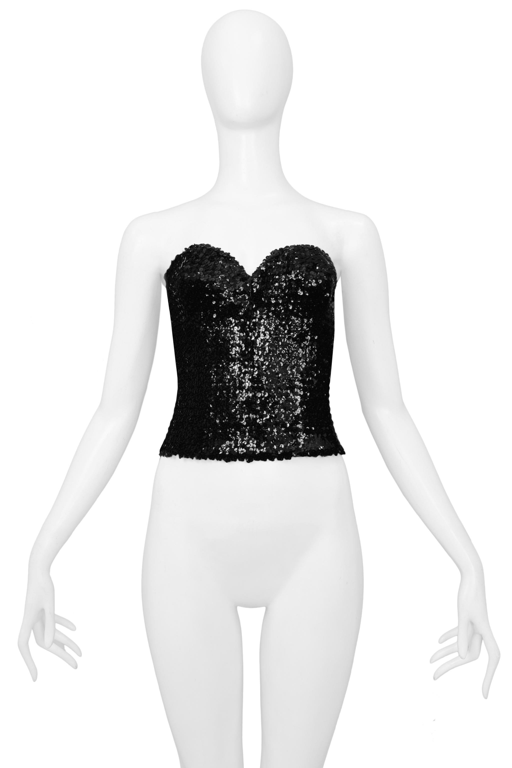 Resurrection Vintage is excited to present a vintage La Perla black sequin bustier featuring sculpted cups and a back center zipper. 

La Perla
Size: M
Sequin and Elastic
Excellent Vintage Condition 
Authenticity Guaranteed 