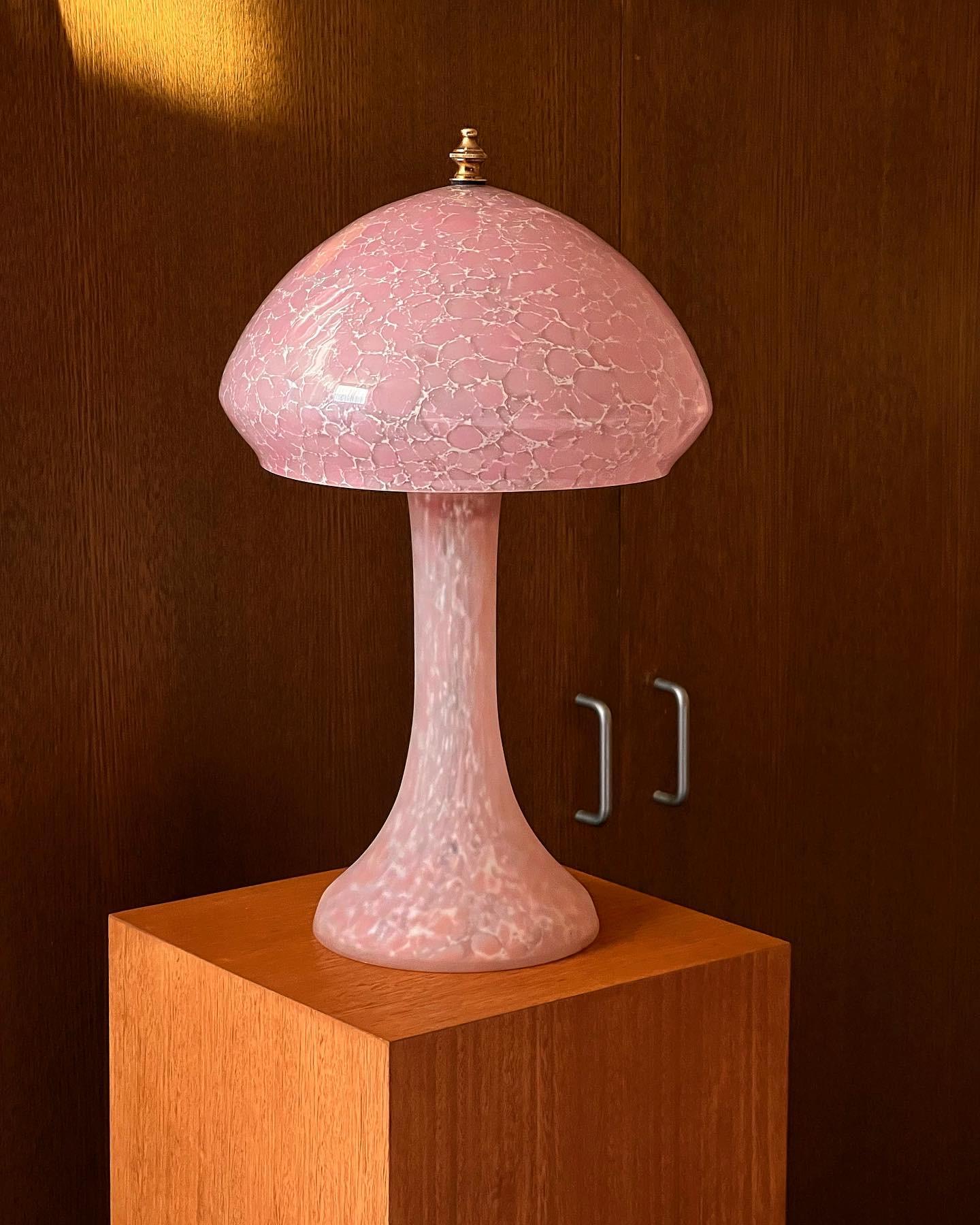 Made in France, circa 1970s. Both with original La Rochere stickers.
The price displayed is per lamp, I have two available. 
Crafted from pink and white veined blown glass. The mushroom dome features a glossy finish, while the base has a matte