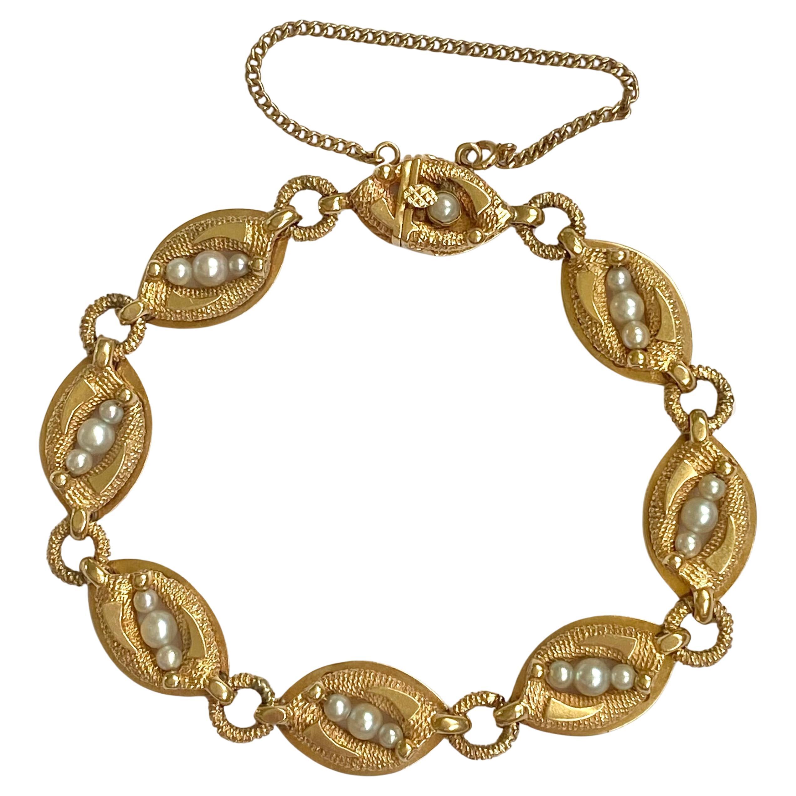 Bracelet vintage La Triomphe en or jaune 14 carats et perles