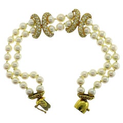 Bracelet vintage La Triomphe en or jaune 18 carats avec perles