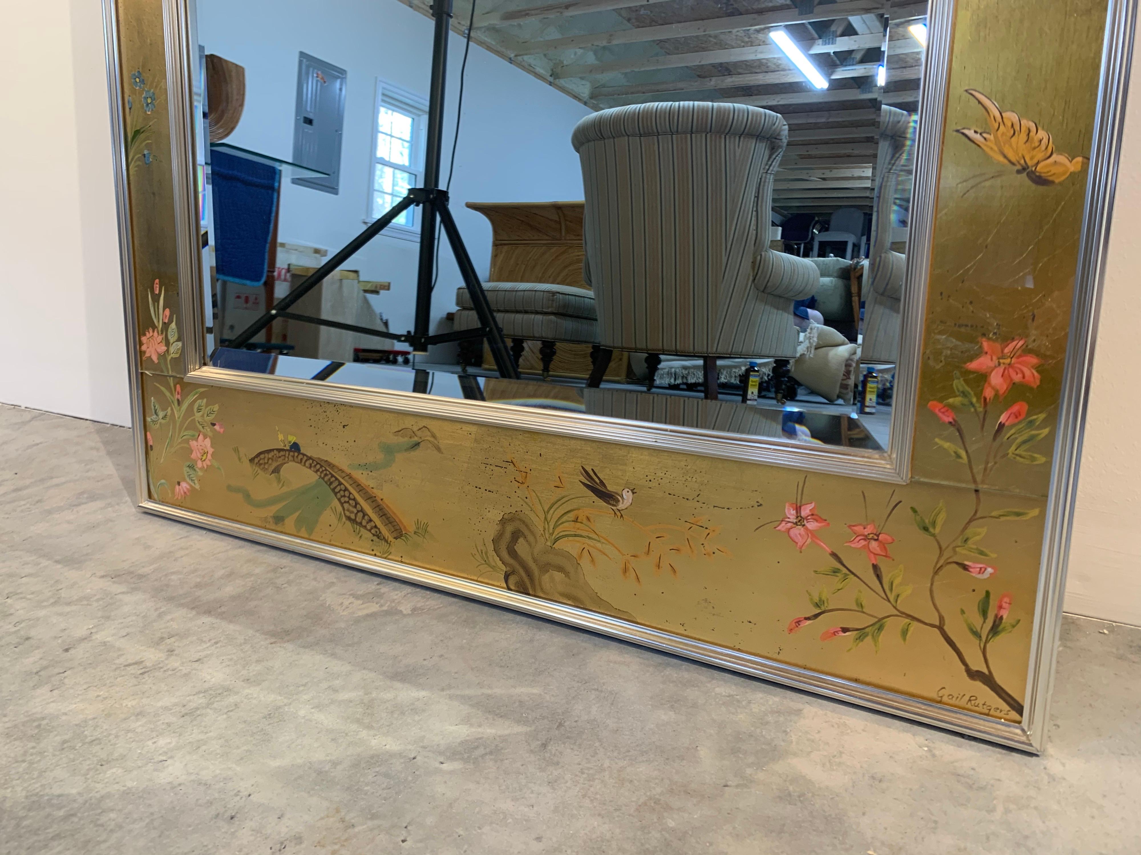 An exquisite Labarge Chinese/Asian chinoiserie style mirror. Outstanding quality, gold leaf overlay on reverse painted glass. The mirror is beveled.

Hand painted and signed by the artist 'Gail Rutgers', who we know was painting for Labarge, since