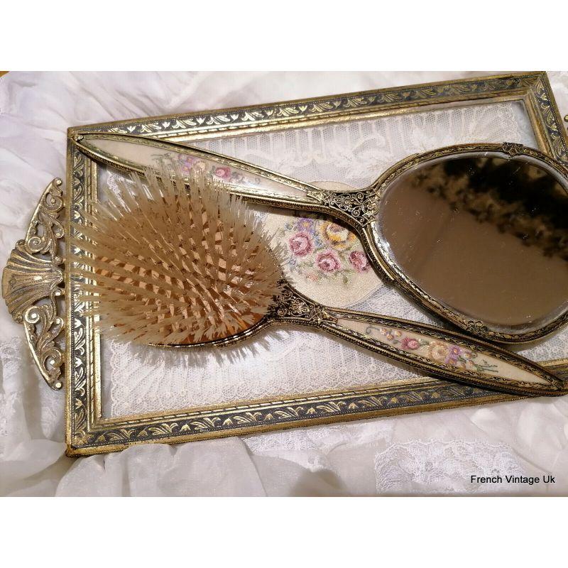 Vintage Lace Glass Tray dressing Table Vanity Hand Mirror Hair Brush Embroidered in very good condition. It could be a lovely gift.

Colour: Multicoloured
Material: Mirror
Pattern: Embroidered
Features: Carvings, Mirrored
Finish: Brushed
