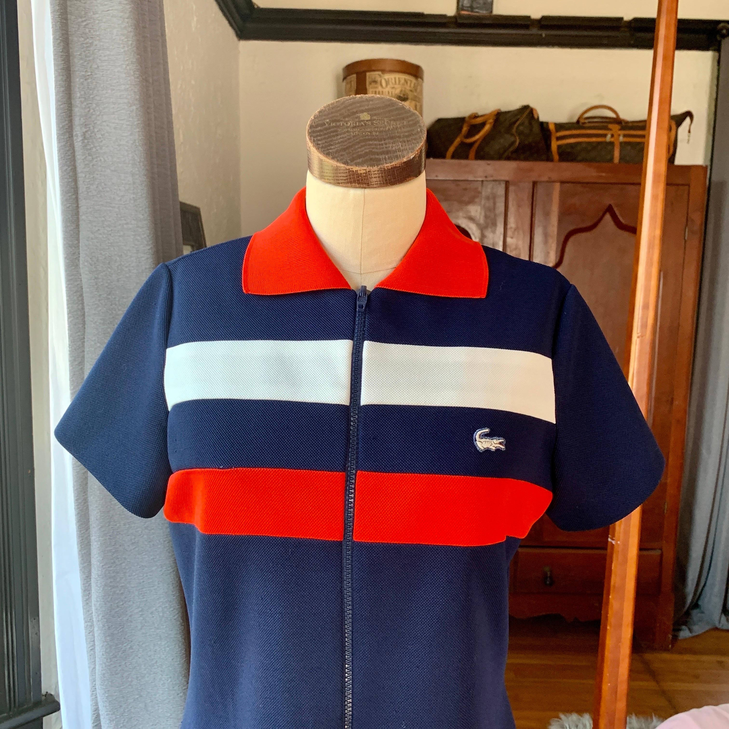 Lacoste, David Crystal, Blue Dress, Red and White Stripe, Iconic Alligator, Zipper Front, Polyester, No Size

Measurements Laying Flat (has stretch)
Bust 20