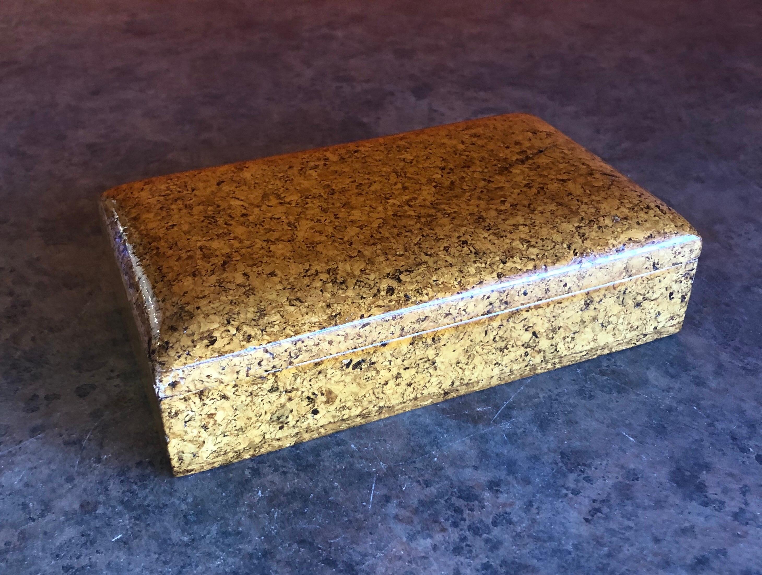 A very cool vintage lacquered cork trinket box in the style of Paul Frankl, circa 1960s. The box is well crafted with a removable lid and measures 7