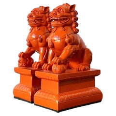 Vintage Lacquered Orange Foo Dogs - A Pair
