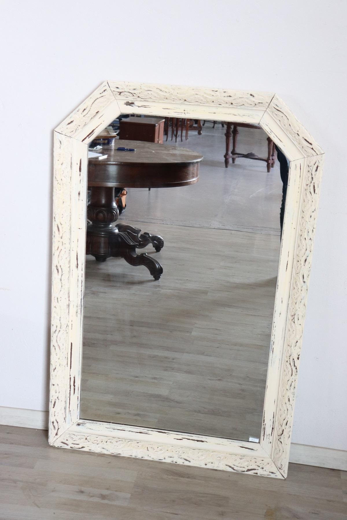 Lovely vintage white wall mirror in lacquered wood.