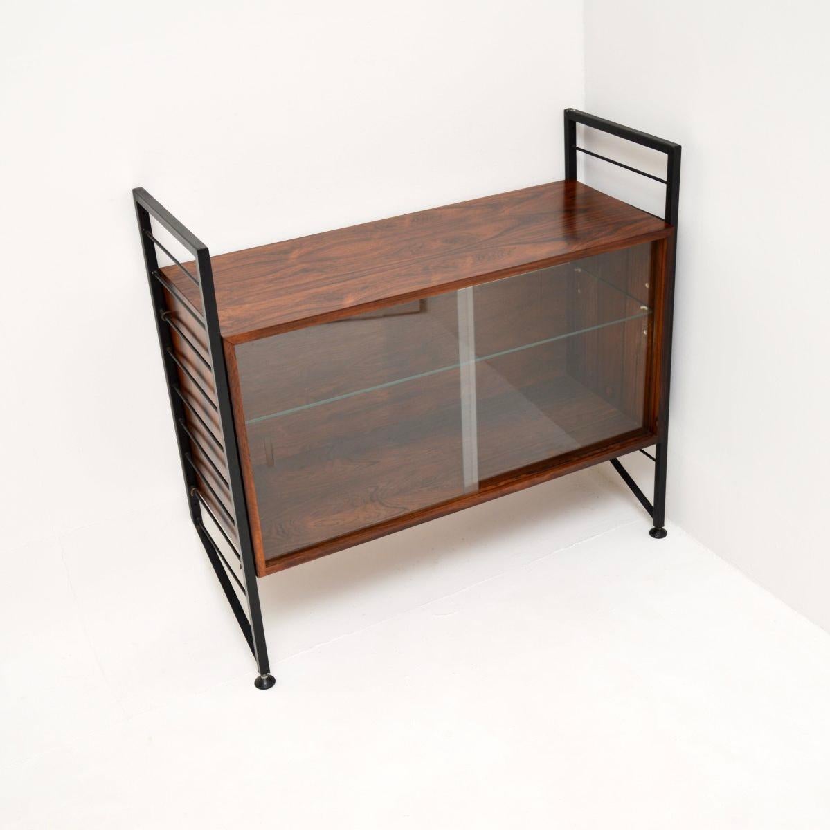 A stylish and useful vintage ladderax cabinet. This was made in England by Staples, it dates from the 1960’s.

These particular ladderax units are extremely rare, this is of superb quality and is beautifully designed. The cabinet is supported by
