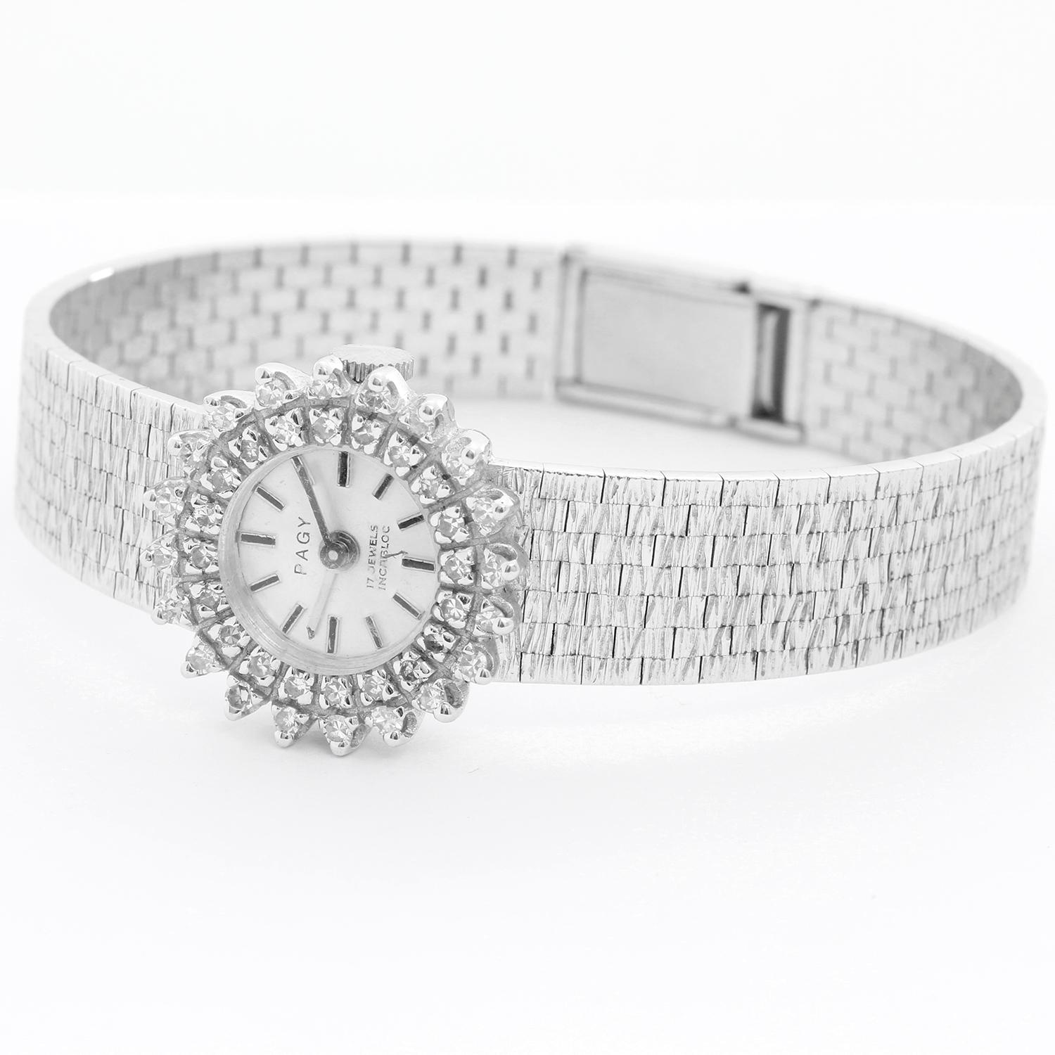 Vintage Ladies 18k White Gold & Diamond Pagy Watch -  Manual winding. 18k white gold case with beautiful diamond bezel (20mm diameter). Silver dial with stick markers. Note: slight imperfection at 6 o'clock. 18k white gold integrated mesh bracelet.