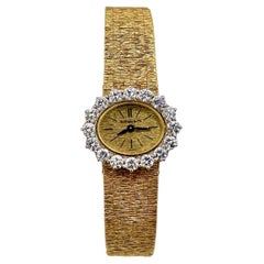 Vintage Ladies 18k Gold Tiffany & Co Wrist Watch with Diamond Bezel by Piaget