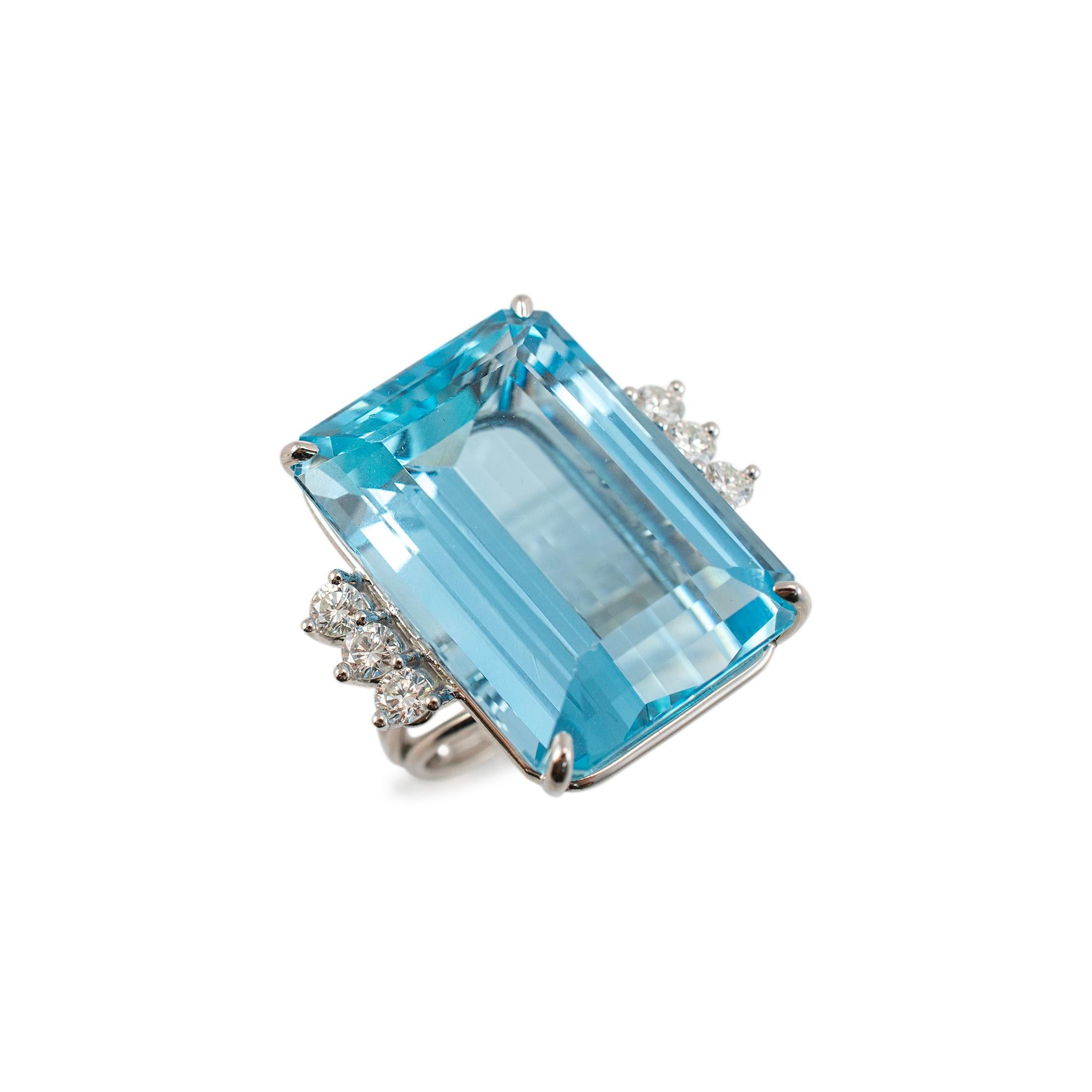 Gender: Ladies

Metal Type: 18K White Gold

Size: 5

Weight: 19.09 Grams

18K white gold six-across diamond and aquamarine cocktail ring with sizing balls, with a half round shank. The metal was tested and determined to be 18K white gold.

Pre-owned