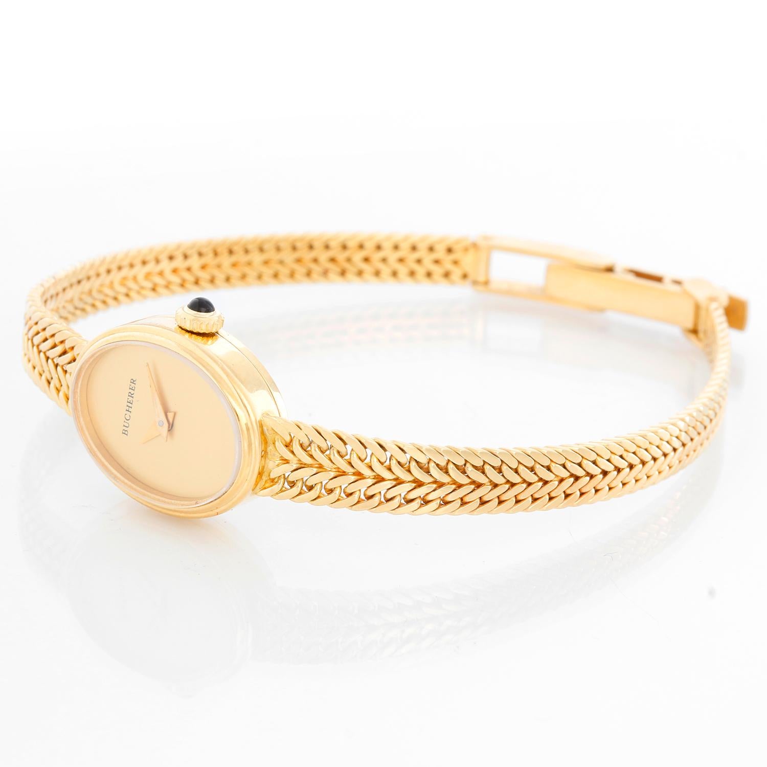 Vintage Ladies 18k Yellow Gold Bucherer Watch - Manual. 18k Yellow Gold (16 x 19 mm). Champagne dial. 18K yellow gold bracelet with adjustable clasp; will fit up to a 6 1/2 inch wrist. Pre-owned with Bucherer box. 