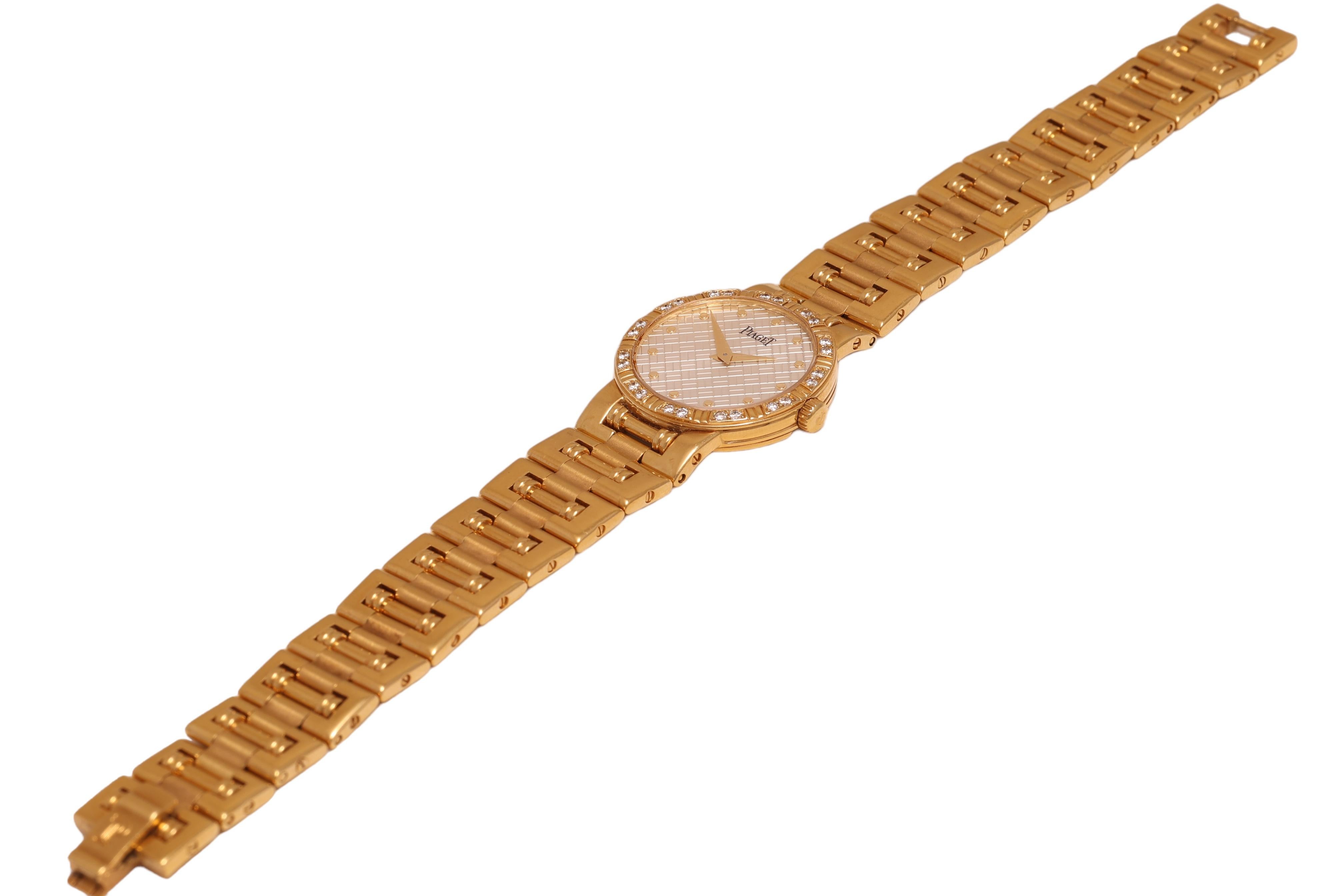 Artisan Vintage Ladies 18kt Gold Piaget Dancer Diamonds Wrist Watch, Quartz , Diam 23 mm For Sale