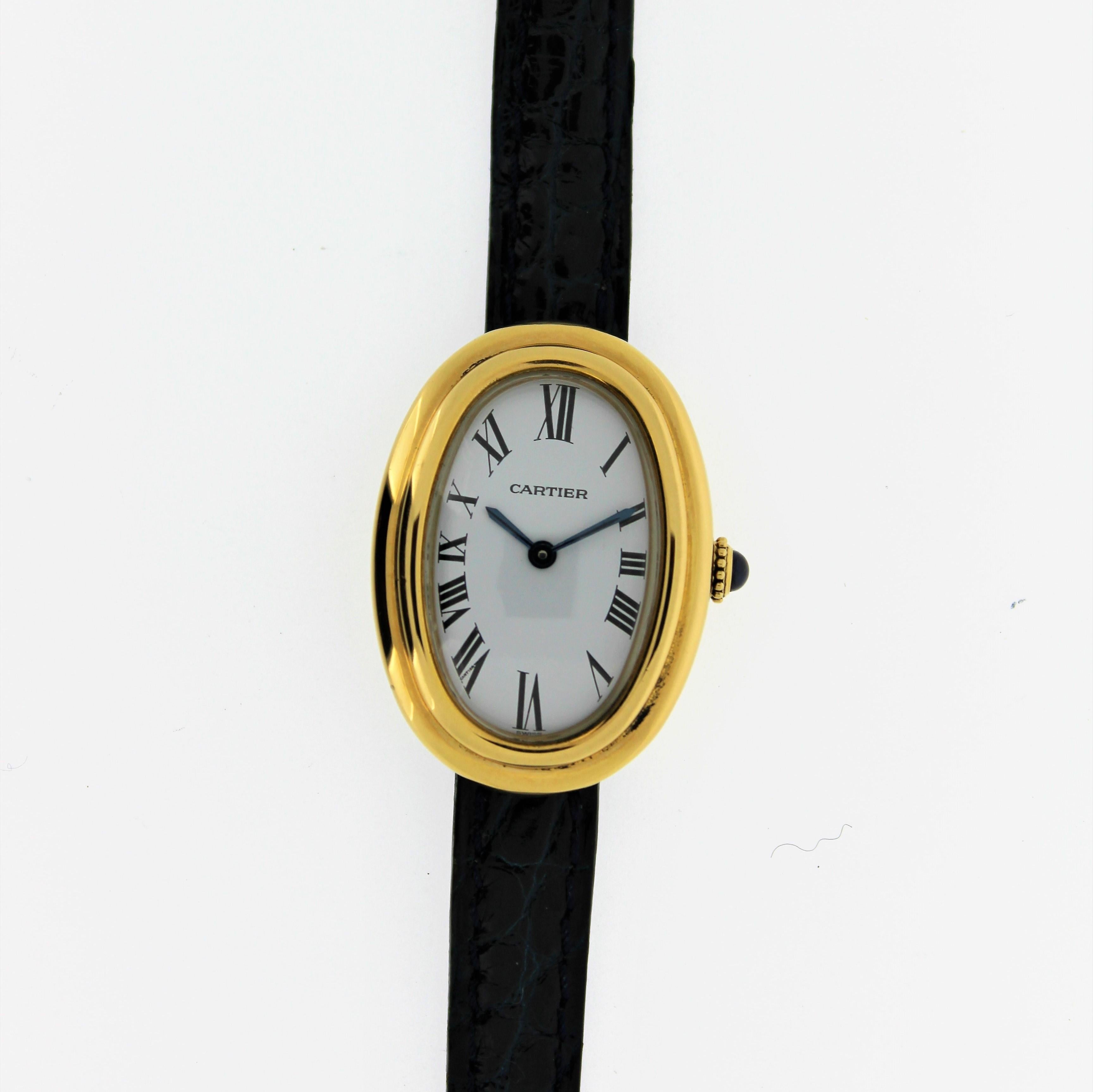 Introduction:
This Vintage Cartier Paris Baignoire watch is oval shaped, circa 1975-1980.  It is 18K yellow gold and measures 31 x 22mm with mechanical manual movement with 17 jewels.  It has a Cartier crocodile strap and 18K Cartier Buckle.  It is