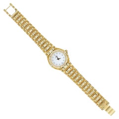 Montre cordon vintage pour femme en or jaune 18 carats et diamants, c. 1980