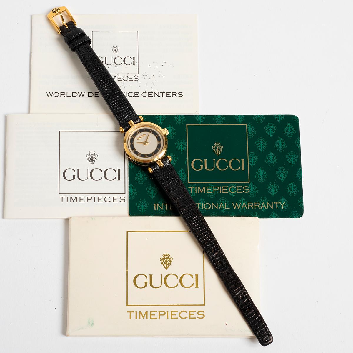 Our vintage ladies Gucci quartz is an iconic reference 2000L with heavy gold plated steel and glass case (21mm) with central lug. The example is amongst the best early 2000 reference we have handled, and is an attractive combination, with black