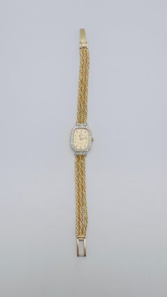 Vintage Ladies Omega 14K Yellow Gold Diamond Watch with Florentine Finish Bezel