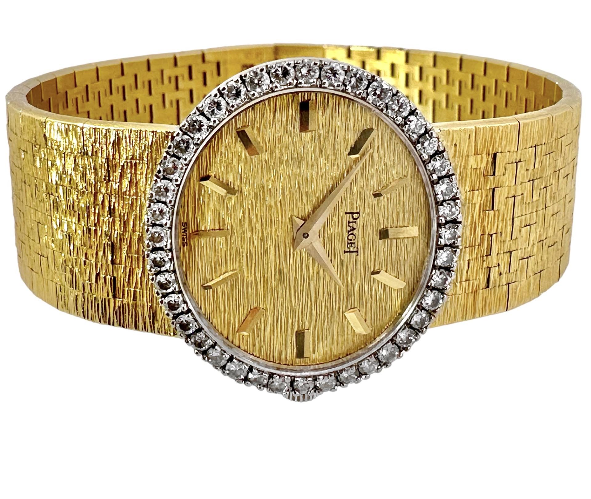 This sophisticated, vintage, ladies 18k yellow gold horizontal oval wristwatch is finished over its entire surface in deep bark finish texture. Even the dial is fashioned in this manner, giving this delightful piece a truly unique and tailored