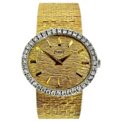 Vintage Ladies Oval Shaped Diamond Bezel Yellow Gold Piaget