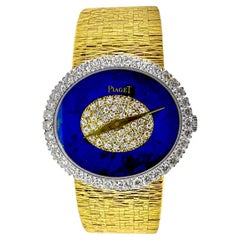 Vintage Ladies Piaget Wristwatch Oval Lapis Lazuli 
Diamond Dial in Yellow Gold