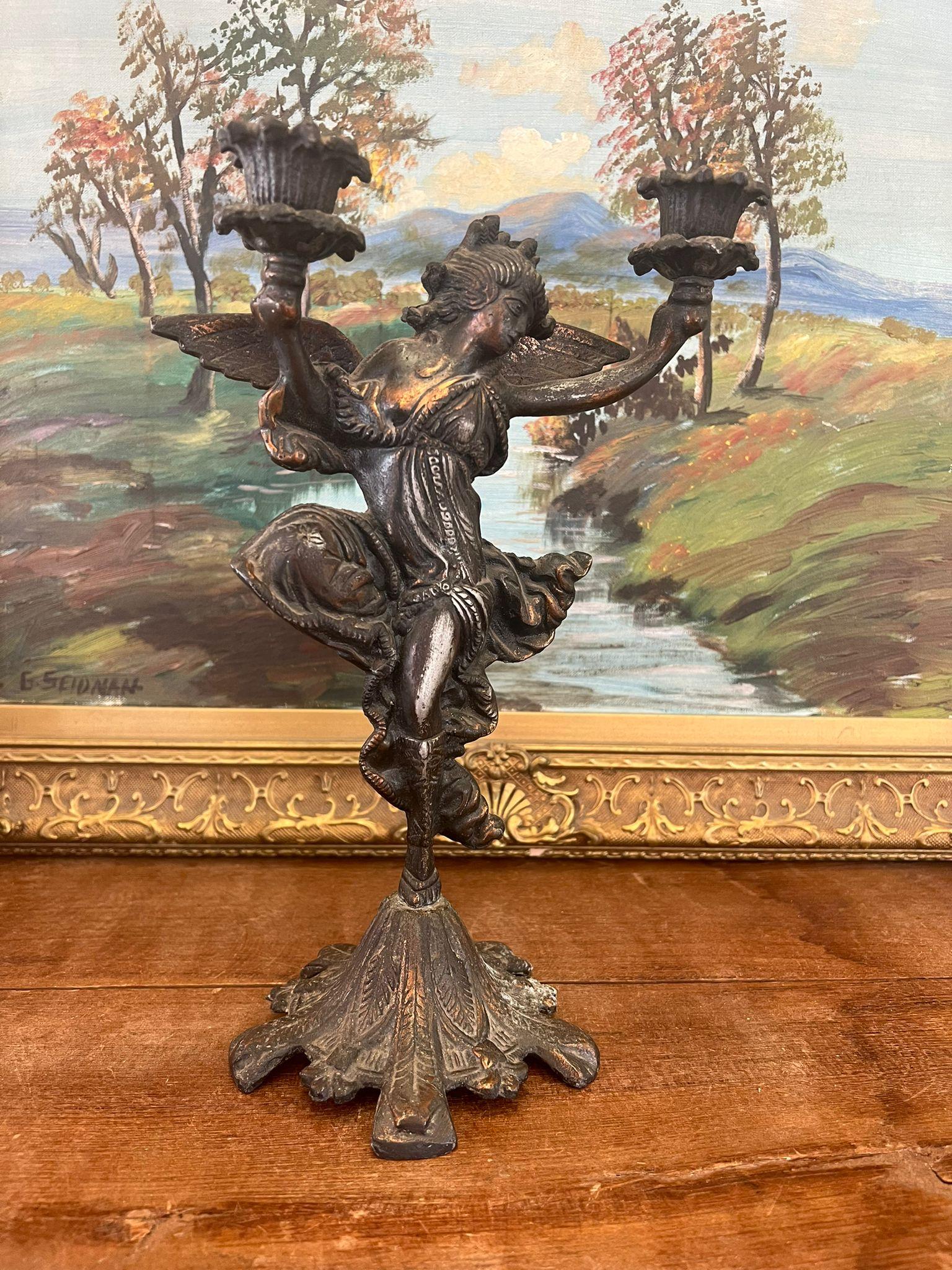 Possibly Brass in material but not confirmed. This Piece has nice patina and character. Vintage Condition as pictured. Listing is for described item only.

Dimensions  7.5”W ; 2”D ; 11.5”H

