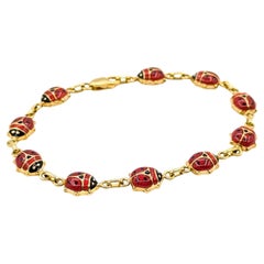 Bracciale vintage con smalto a forma di coccinella in oro giallo 14k