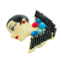 Vintage lady’s head plastic designer brooch