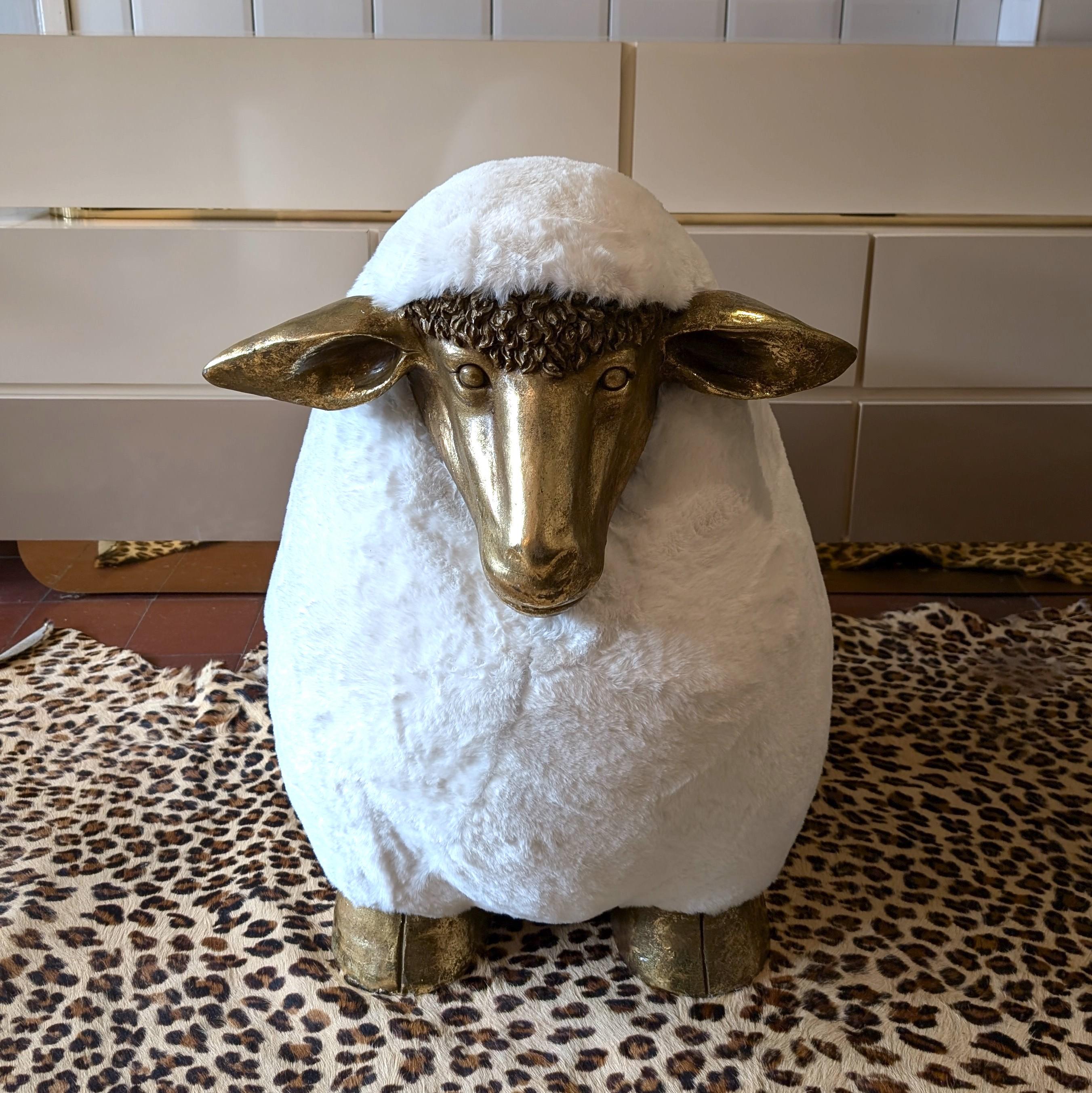Want a Lalanne sheep but can't quite scrape together the £500,000?
We have you covered with this distant relative: vintage Lalanne ish sheep footstool. Faux fur upholstery, gold fibreglass head and legs. In excellent condition, just a few bits of