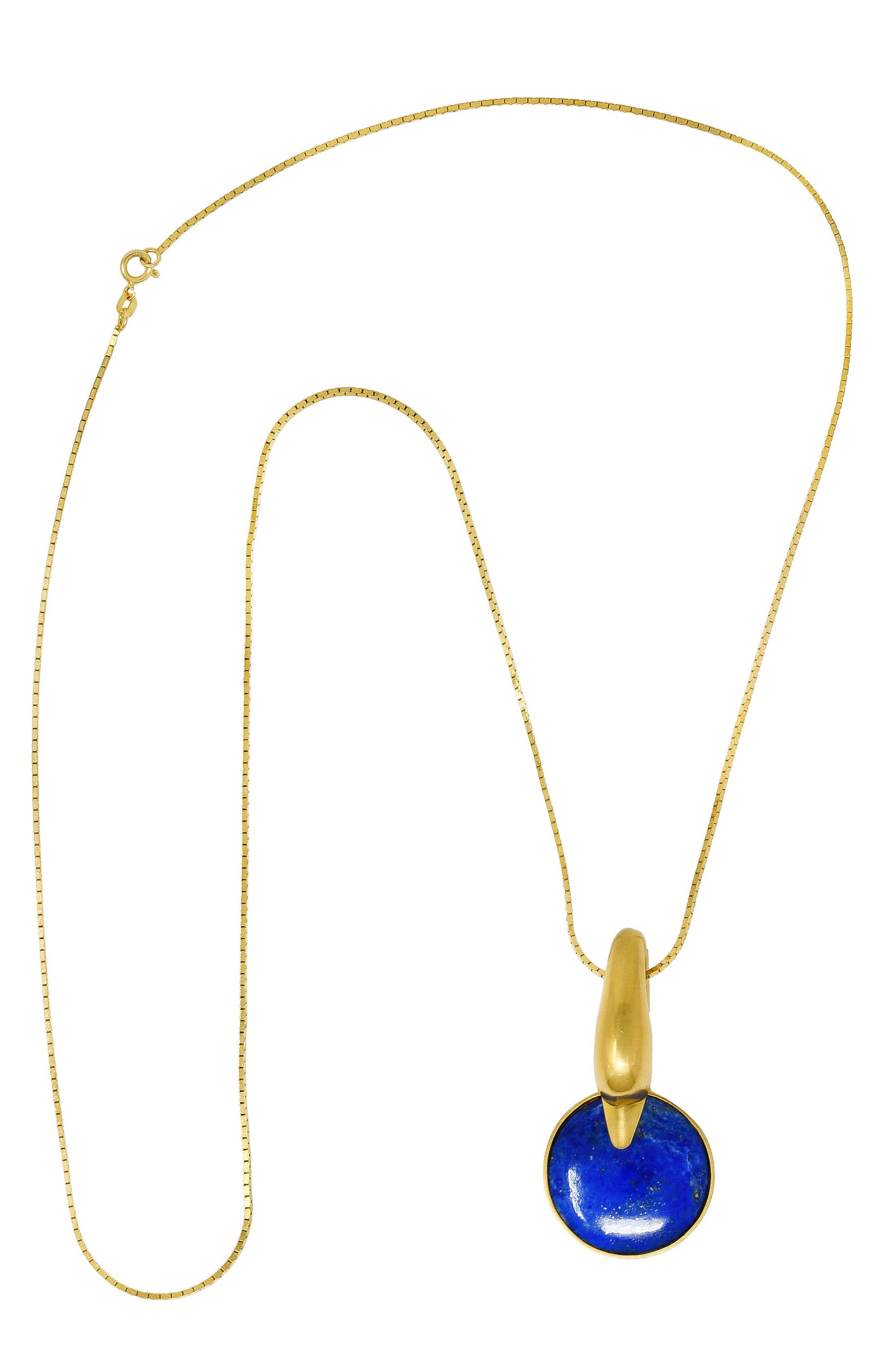 Designed as 1.0 mm box chain suspending stylized pendant

Pendant designed as sleek swan head arching over 26.5 mm Lapis Lazuli cabochon

Lapis is opaque ultramarine blue with moderate mottling and pyrite flecking

Completed by spring clasp