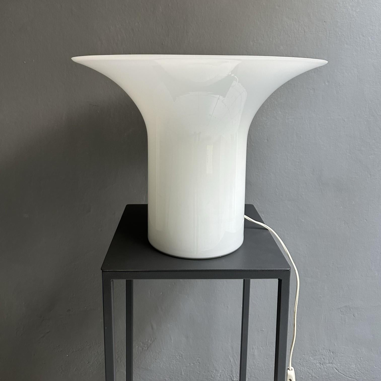 
Seventies lamp, Italian manufacturing
Given its size, the milk white Murano glass lamp can be used both as a table lamp and as a floor lamp, creating a light point.
Dimensions:
Height: 32.5
Diameter: 42.5 cm
The lamp works correctly.
