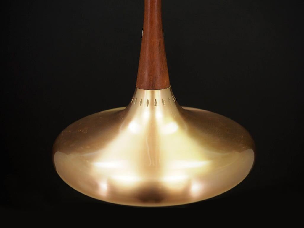 Scandinavian lamp from the 1960s-1970s, designed by Jo Hammerborg for Fog & Mørup, made of metal, color - gold. Preserved in good condition (minor scratches, visible discoloration from the inside) - directly for use.

Dimensions: diameter 36 cm.