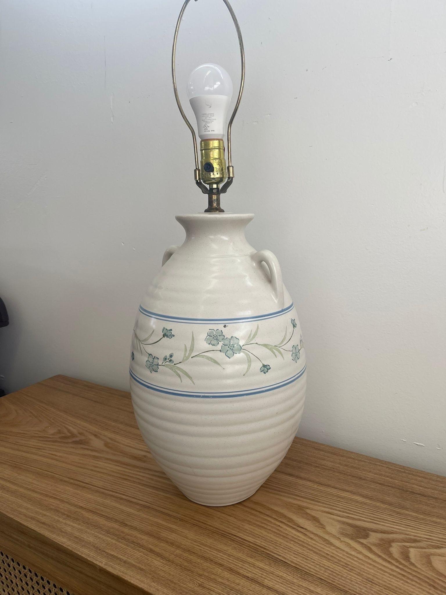 Mid-Century Modern Vintage Lamp With Ceramic Vase Base and Floral Motif. For Sale