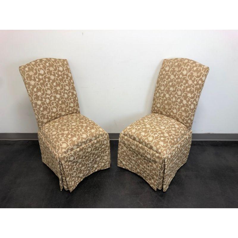 A pair of Transitional style Parsons chairs by Lane Venture. Solid wood frame, brown & beige color fabric upholstered, and fully skirted. Made in the USA, in the early 21st Century.

Measures:  Overall: 20 W 27 D 40 H, Seats: 19 W 17 D 20