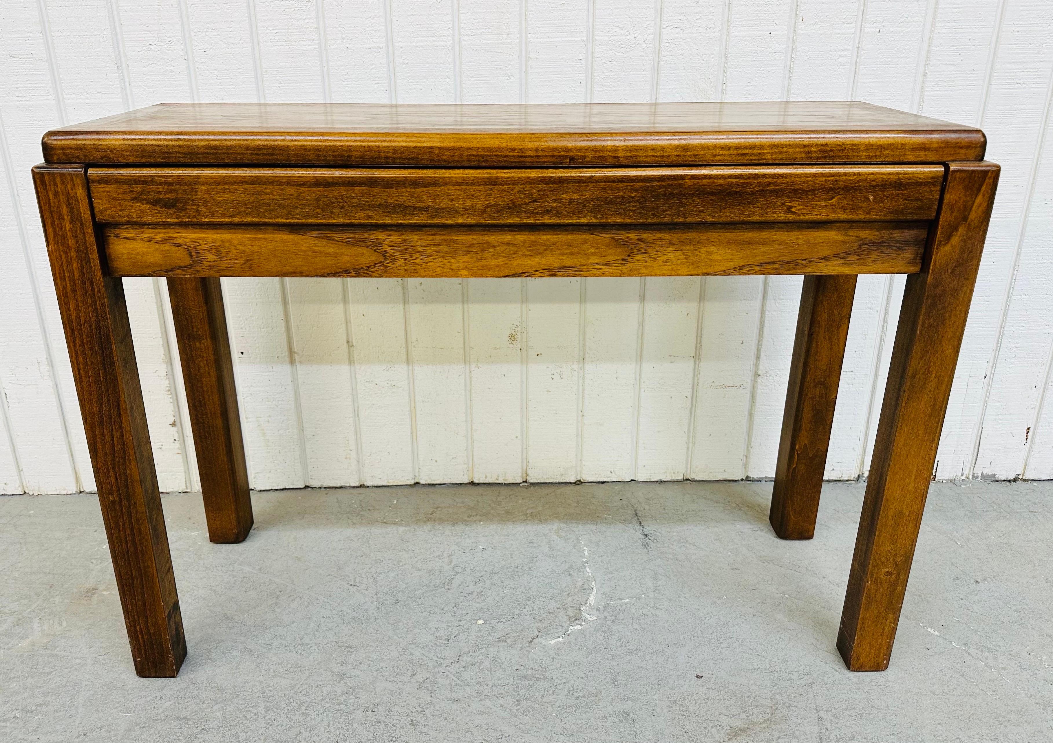 This listing is for a vintage Lane Walnut Console Table. Featuring a straight line design, rectangular top, corner legs, and a single hidden drawer that pulls out for storage. This is an exceptional combination of quality and design by Lane.