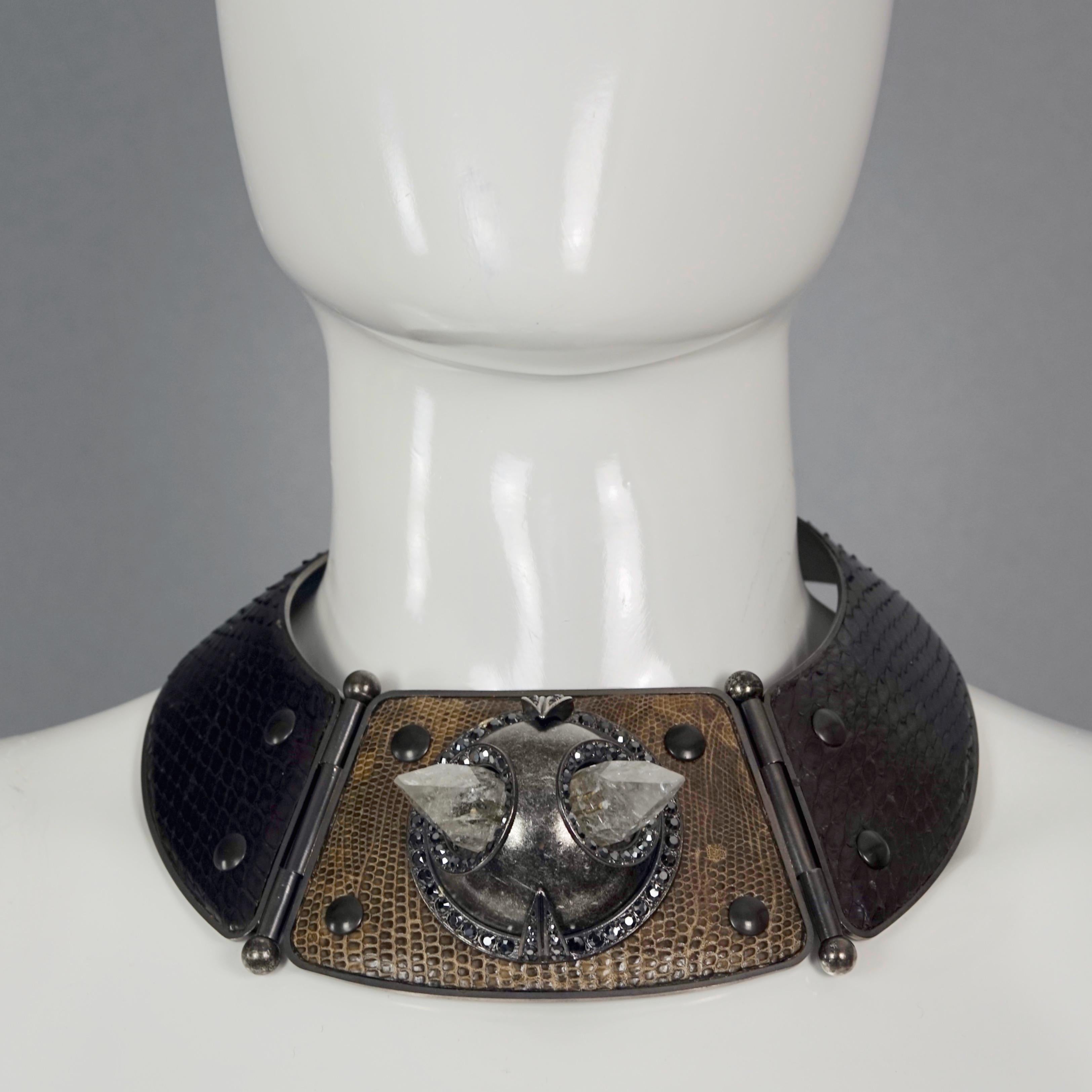 Vintage LANVIN by ALBER ELBAZ Raw Rock Crystal Leather Torque Choker Necklace

Measurements:
Height: 2.55 inches (6.5 cm)
Inner Circumference: 12.60 inches (32 cm) 

Features:
- 100% Authentic LANVIN by ALBER ELBAZ.
- Rigid leather choker with