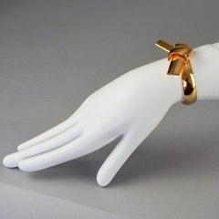 LANVIN Bracelet jonc vintage à nœuds