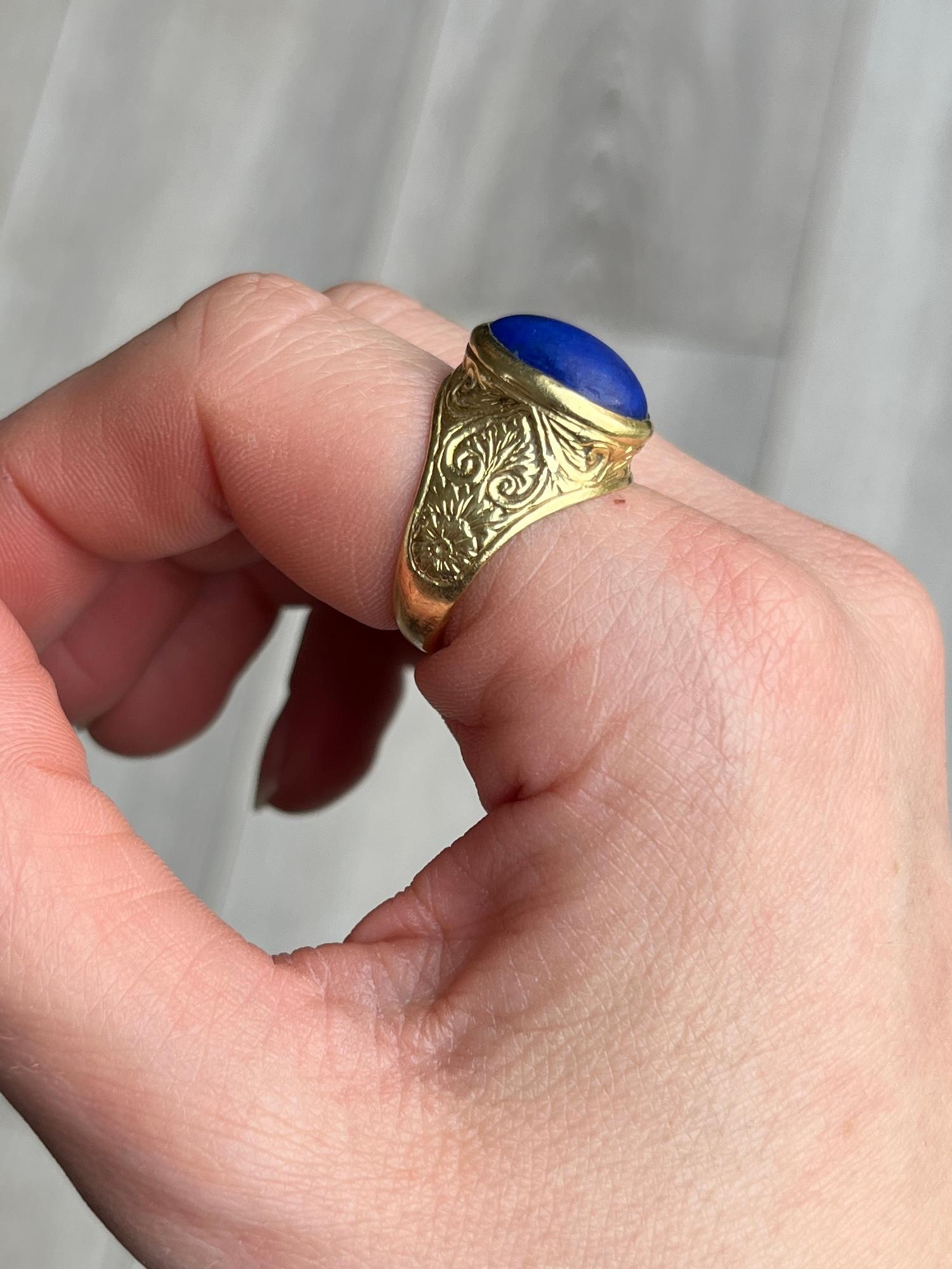 The lapis stone in this ring is beautiful and bright. The smooth cut of the stone goes perfectly with the chunky and decorative gold ring. Modelled in 18 carat gold. 

Ring Size: N 1/2 or 7
Stone Dimensions: 14x10mm

Weight: 7.1g