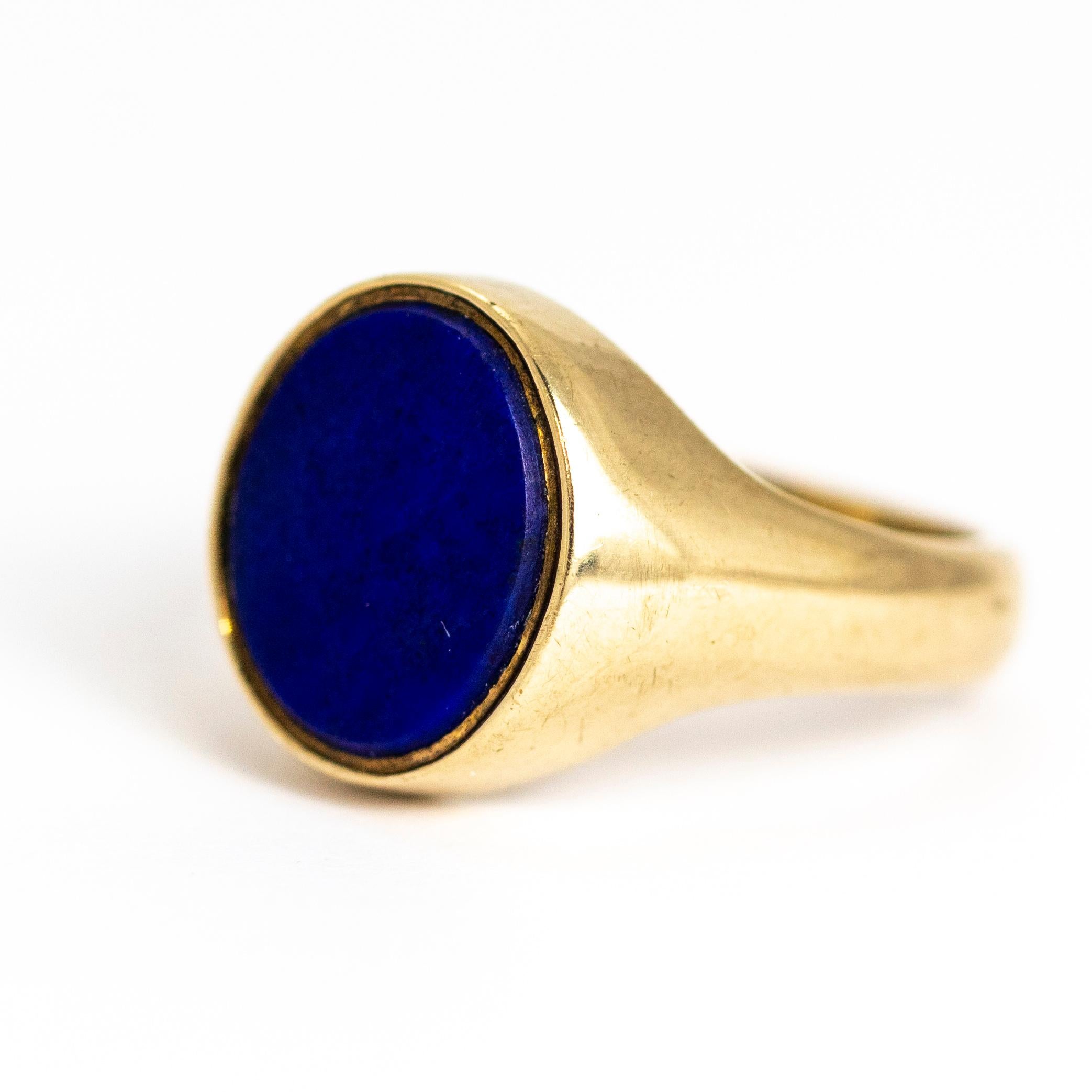 This beautiful, bright blue lapis sits flush in this glossy and chunky 9ct gold signet ring. Made in Birmingham, England.

Ring Size: R or 8 1/2