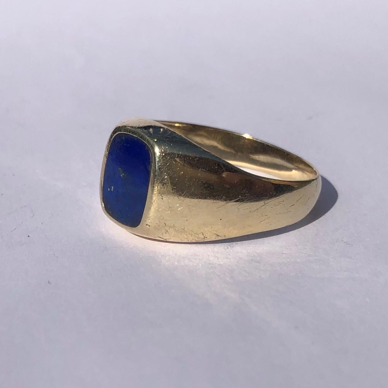 The lapis stone in this ring is beautiful, bright and glossy. The smooth cut of the stone goes perfectly with the chunky gold ring it is set within. Made in London, England. 

Ring Size: Z or 12 1/2 
Stone Dimensions: 10x8mm

Weight: 6g