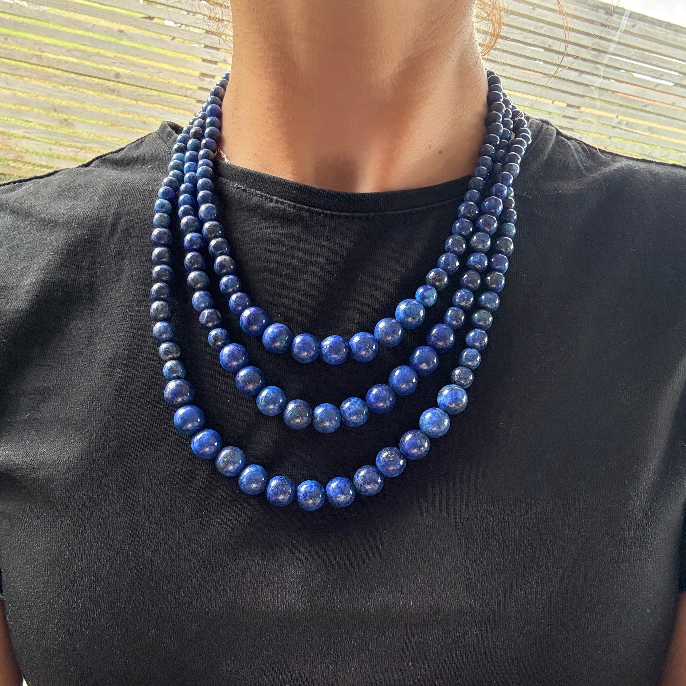 The blue of the gorgeous lapis stone beads really pop in this necklace.

Shortest Length: 44cm
Longest Length: 56
Large Bead Diameter: 10mm

Weight: 139g